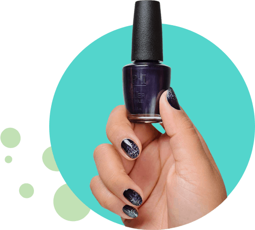 women holding a bottle of navy blue nail polish